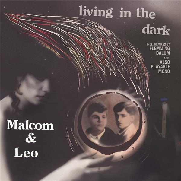 Living In The Dark - Front Cover