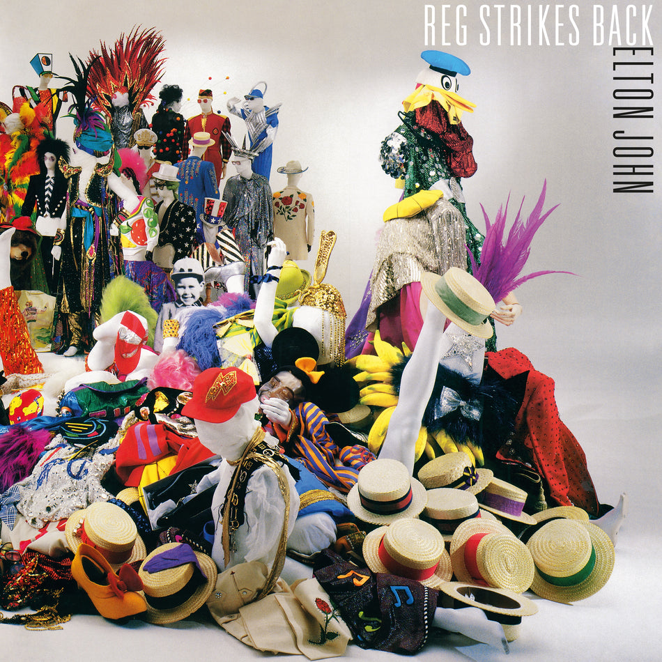 Reg Strikes Back - Front Cover