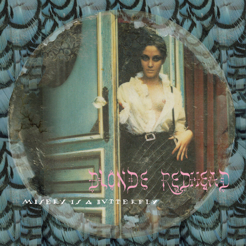 MISERY IS A BUTTER- - Front Cover