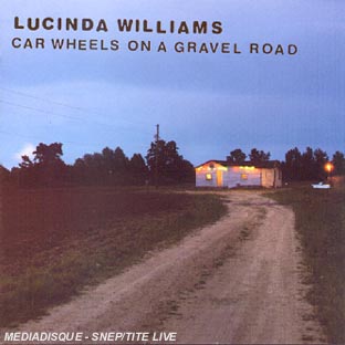 Car wheels on a gravel road - Front Cover
