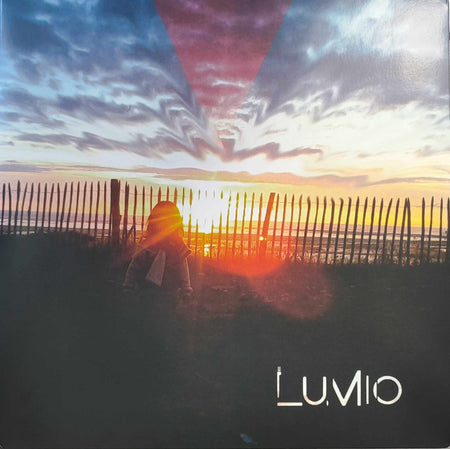 STARING AT THE SUN - Front Cover