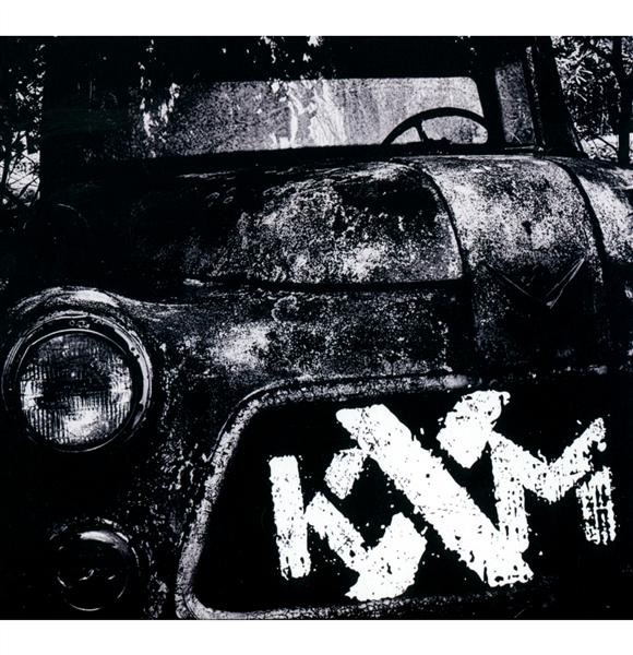 KXM - Front Cover