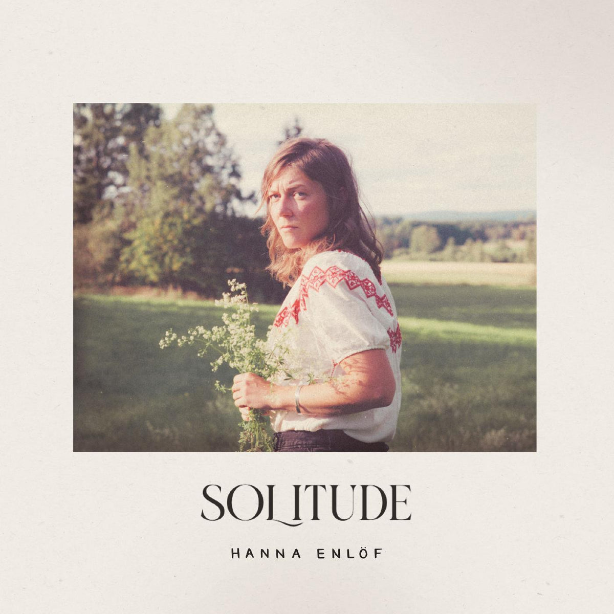 SOLITUDE - Front Cover