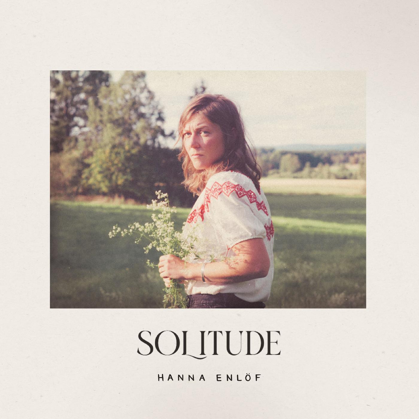 SOLITUDE - Front Cover