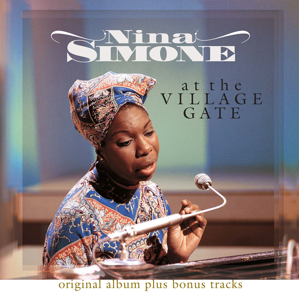 AT THE VILLAGE GATE - Front Cover