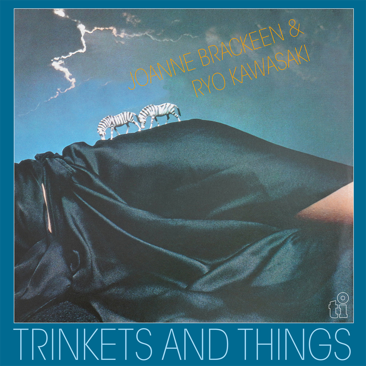 TRINKETS AND THINGS/VINYLE TURQUOISE AUDIOPHILE 180GR/POCHETTE DELUXE - Front Cover