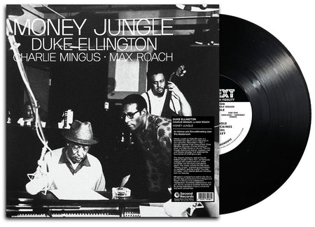 MONEY JUNGLE - Front Cover