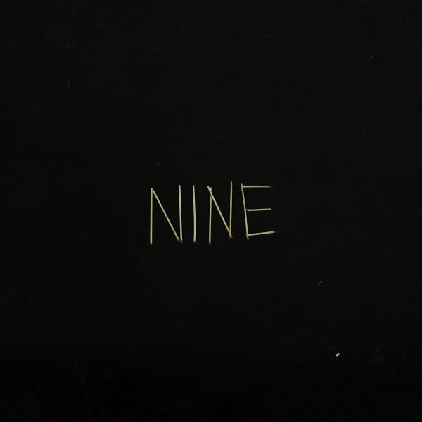 Nine - Front Cover