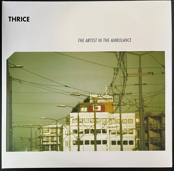 The Artist In The Ambulance Vinyle Coloré - Front Cover