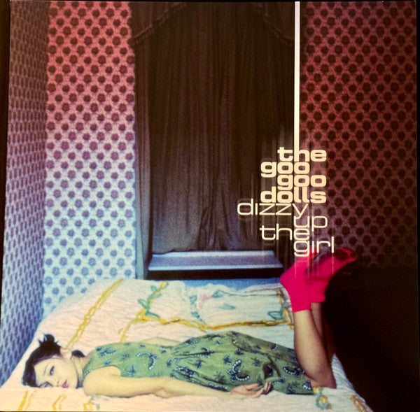 Dizzy up the girl - Front Cover