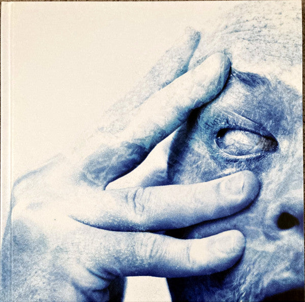 In Absentia - Front Cover