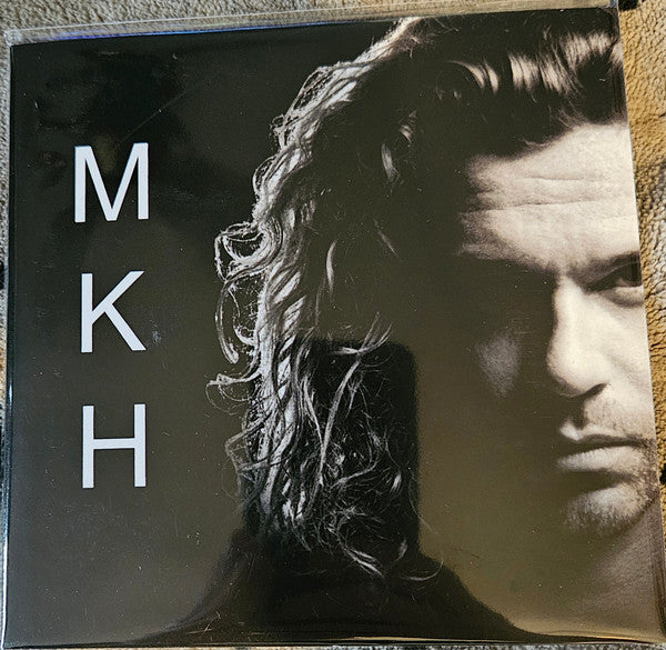 M K H - Front Cover